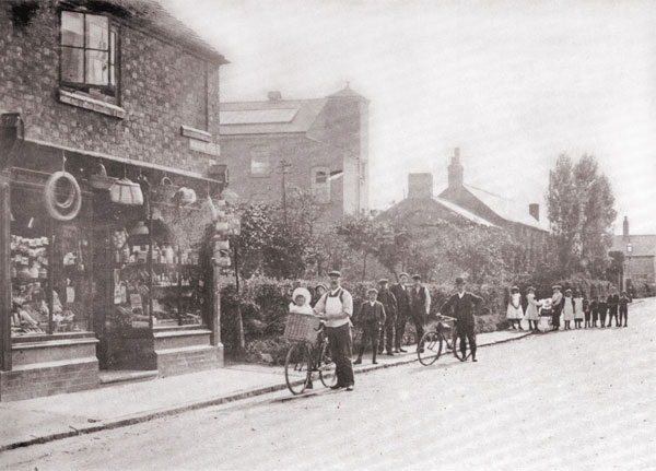 mr newcombe outside his general store along windsor street in burbage