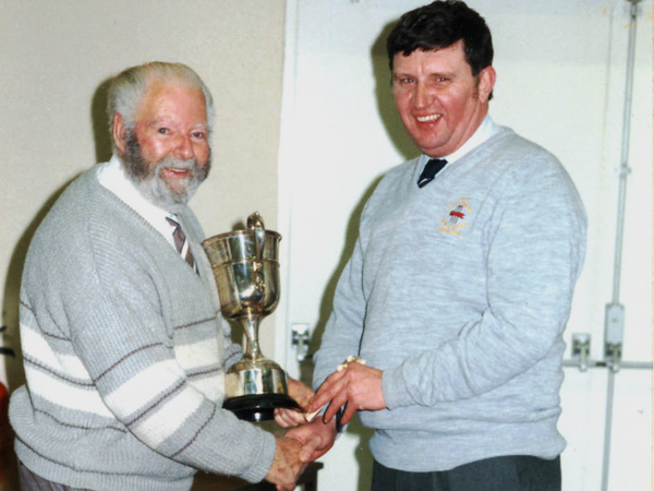 Fred being congratulated by Keith Towers when he was awarded the Ernest Wright Trophy in 1998