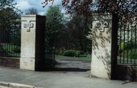 Hollycroft Park gates on Shakespeare Drive, inscribed HUDC-1934