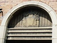 Magistrates entrance, concrete panel with figure of Justice by J. H. Morcom