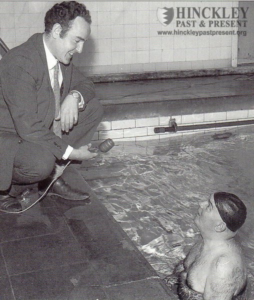 Swimming instructor Ted Ellis being interviewed